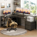 Bureau d'angle réversible avec tiroir classeur, long support d'écran, station de recharge et bandes LED RVB