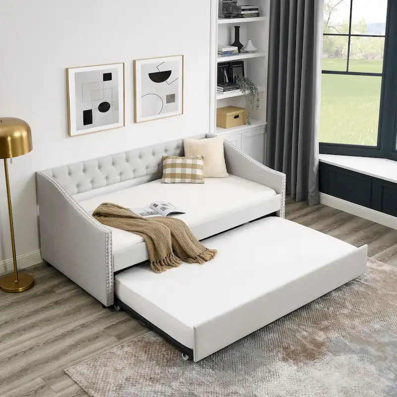 Canapé-lit capitonné avec lit gigogne
