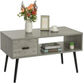 Une table basse avec tiroirs